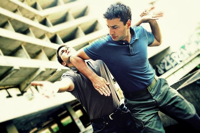 Krav Maga defense training against weapons and multiple attackers - Israeli combat system for real-world threats