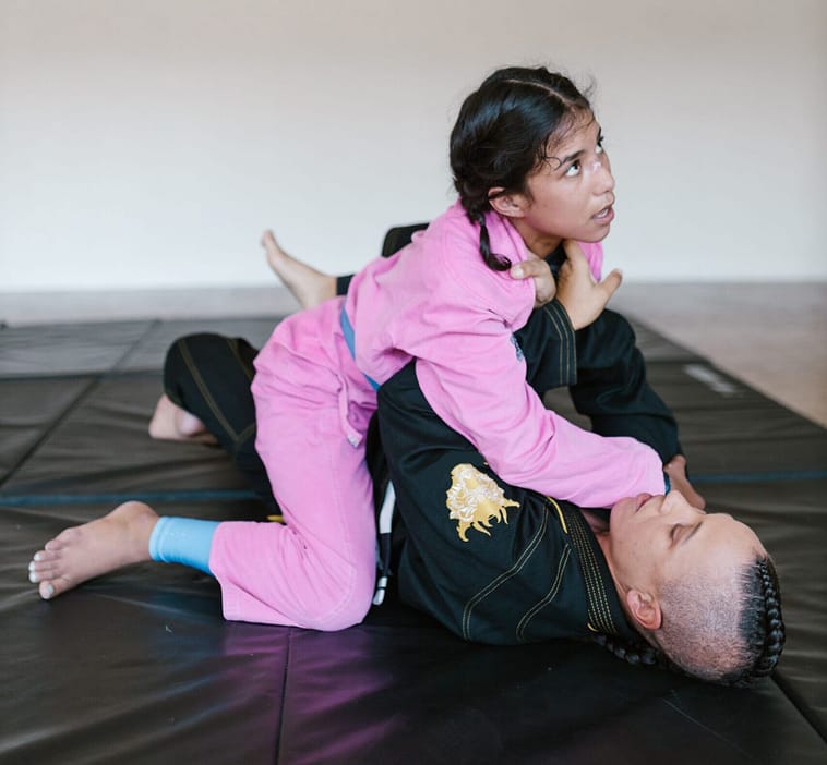 Girl in BJJ Side Control