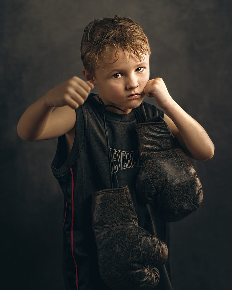 Little boy showing off his left jab Little boy showing off his left jab