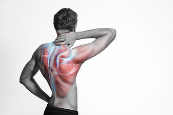 Spine Athlete Experiencing Lower Back Pain II Spine Injury Overview | Fighting Arts Health Lab