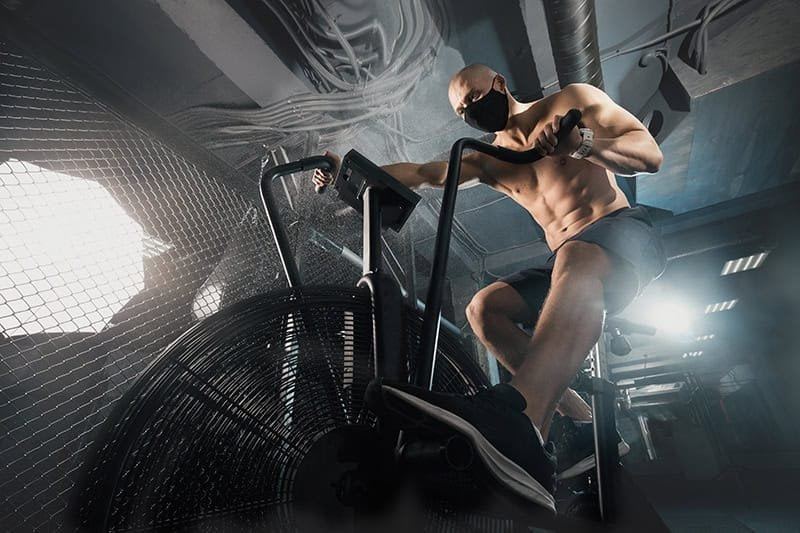 Athlete demonstrating different conditioning exercises for MMA Athlete demonstrating different conditioning exercises for MMA